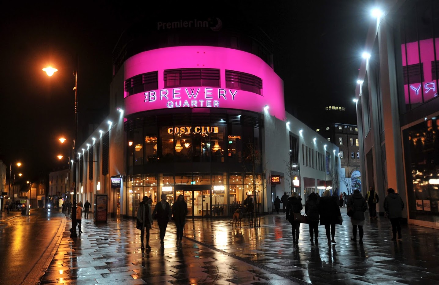 Lit up Brewery Quarter in pink during Light Up Cheltenham