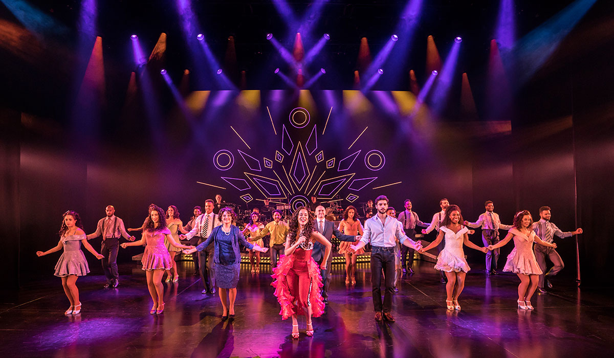 Actors in formation on stage at The Everyman Theatre