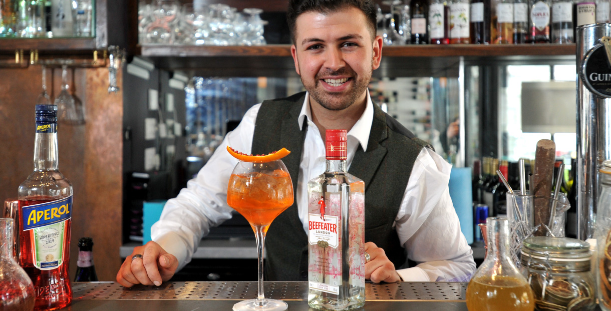 Bartender serving cocktail