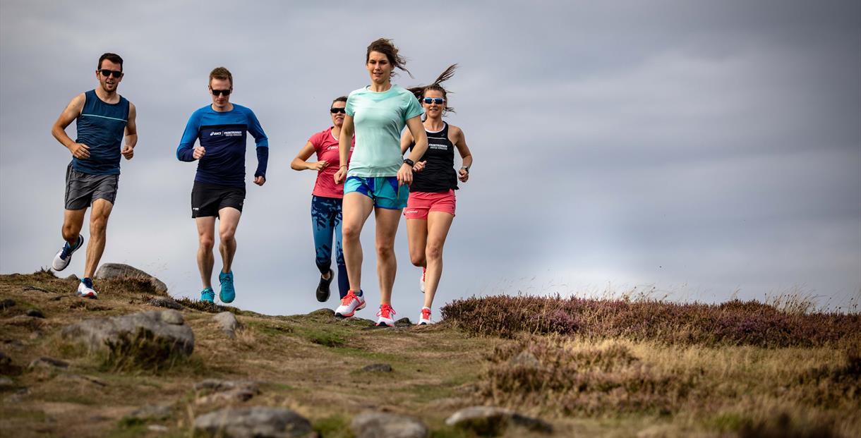 A group of runners outside