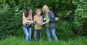 Family following a nature trail in Cheltenham