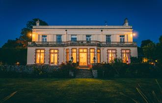Glenfall House, country house hotel exterior at night
