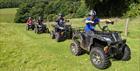 Small group on quad bikes